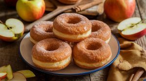 a plate of cinnamon sugar crusted donuts