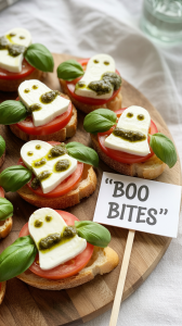 Turn mozzarella slices into ghost shapes using cookie cutters and pair them with tomatoes and basil on crusty bread