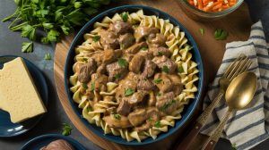 pasta and beef stroganoff in a bowl