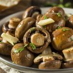 a bowl of garlic butter roasted mushrooms